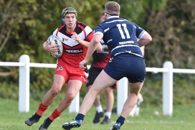 Fryston Warriors' Brandon Worsley faces up to a Featherston Lions opponent. Picture: Matthew Merrick