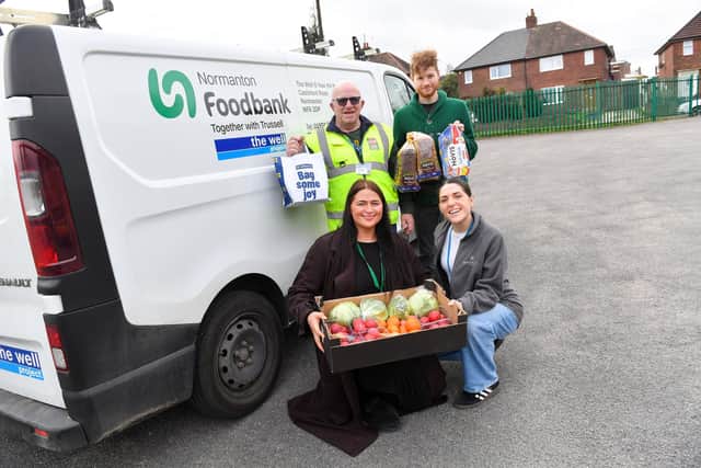 The Barratt and David Wilson Homes volunteers with Arnold of The Well Project.