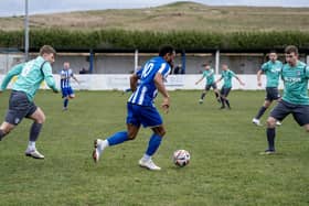 Frickley Athletic goal scorer Alhassane Keita takes on Barton Town defenders. Picture: Scott Merrylees
