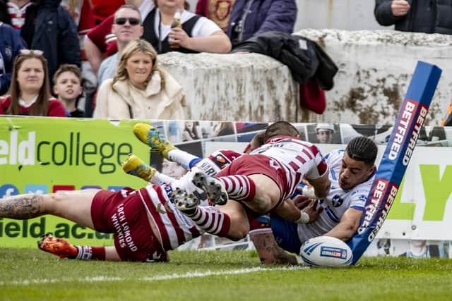 Lewis Murphy scores one of his spectacular tries for Wakefield Trinity in 2022. Picture: Tony Johnson