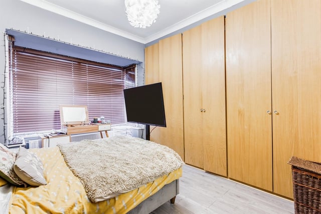 A double bedroom with built-in wardrobes.