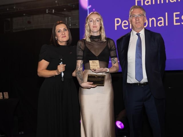Personal Estate Agent Hannah Davies receiving her award.