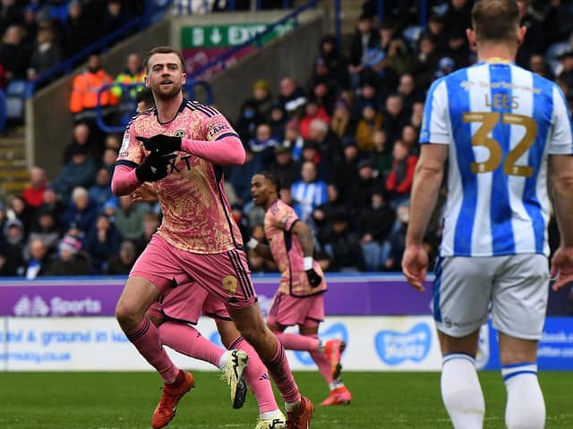 Patrick Bamford celebrates his goal for Leeds United at Huddersfield Town.