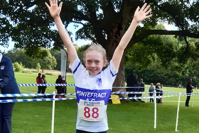 Sienna Lavine celebrates winning the Under 11 girls race in the West Yorkshire Cross Country League at Nunroyd Park, Yeadon.