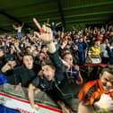 Jubilant Castleford Tigers fans enjoy the vital victory at Wakefield Trinity. Photo by Allan McKenzie/SWpix.com