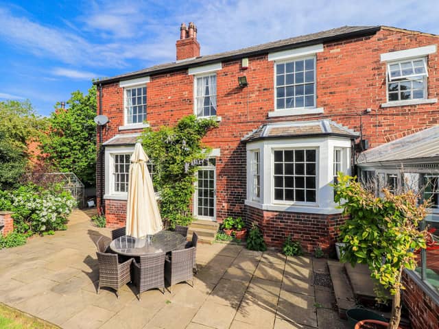The attractive property has extensive gardens and a stone paved patio area.