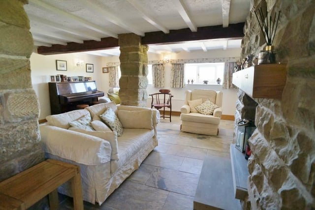 Another aspect of the spacious lounge within the property.
