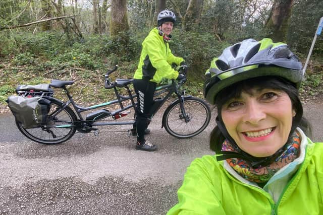 Dr Linda Harris OBE, CEO of Spectrum Community Health CIC, aims to cycle up to 50 miles a day on a tandem e-bicycle in a challenge dubbed '10 Tarns on a Tandem.'