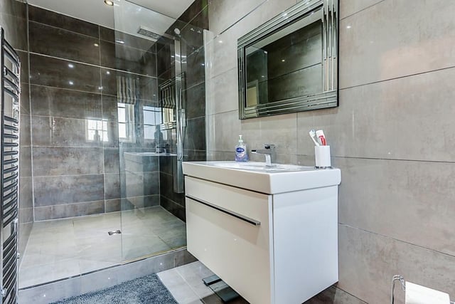 There's a super-size walk in shower in this en-suite facility.