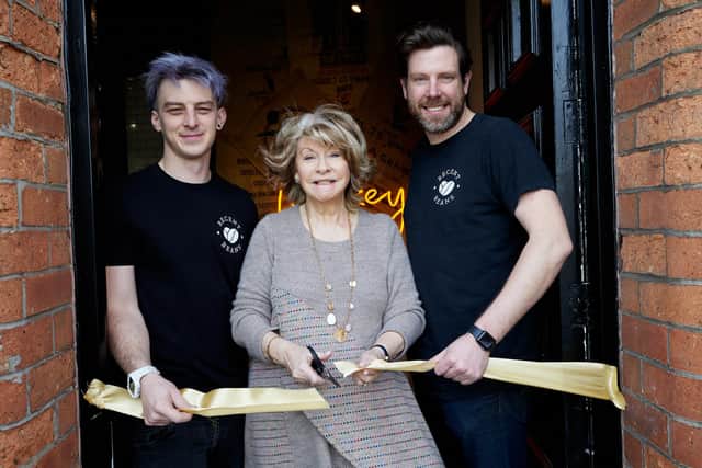 Coun Denise Jeffery cuts the ribbon at Recent Beans in Wakefield with Gaz Poole (left) and Barry Back