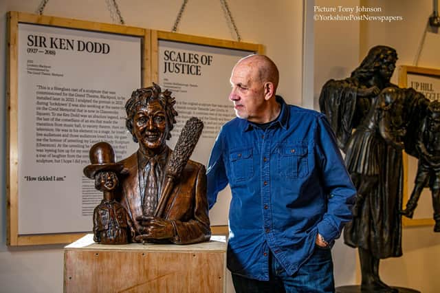 Sculptor Graham Ibbeson with his latest work of Sir Ken Dodd. Photo Tony Johnson
