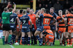 A coming together of Castleford Tigers and Featherstone Rovers players on the last occasion when the teams met.