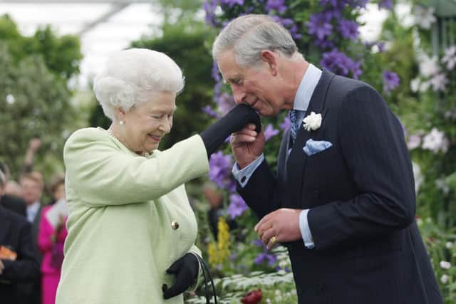 Her Majesty Queen Elizabeth II and His Majesty King Charles III.