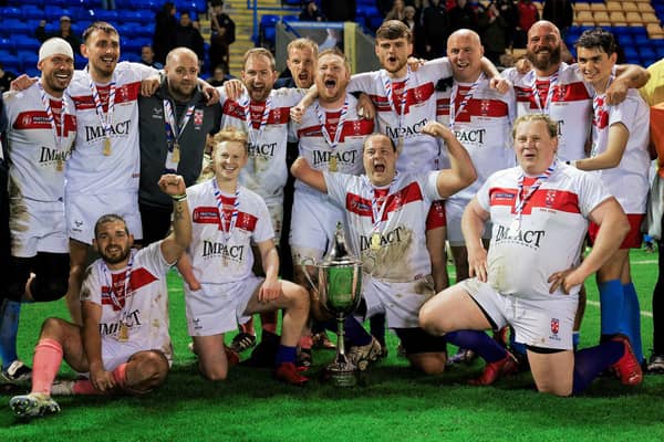 England players celebrate after winning the first PDRL World Cup at Halliwell Jones Stadium, Warrington. Picture: Alex Whitehead/SWpix.com