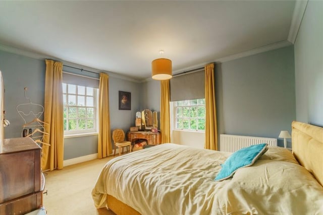 One of four spacious double bedrooms.
