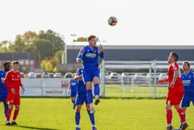 Spencer Clarke heads the ball clear for Pontefract Collieries in their NPL East game against North Shields. Picture: Josh Harper