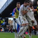 Junior Firpo celebrates his winning goal against Southampton with Leeds United teammates.