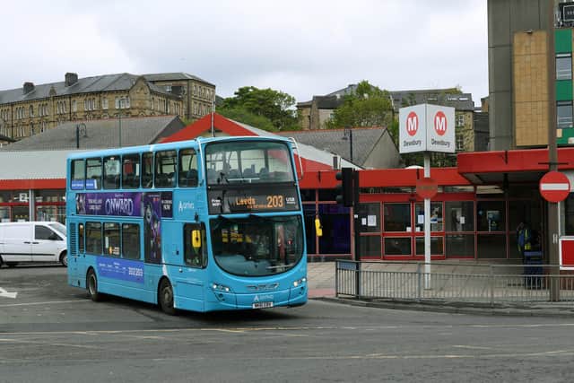 An Arriva bus leaves Dewsbury Bus Station