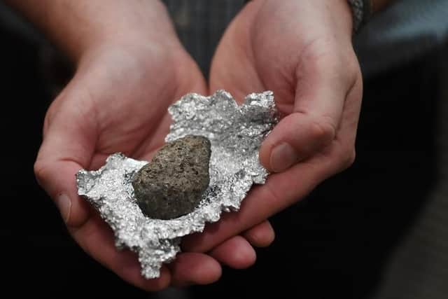 The rock seemed to match this hypothesis as it smelled like it had been “in a fire”. SWNS