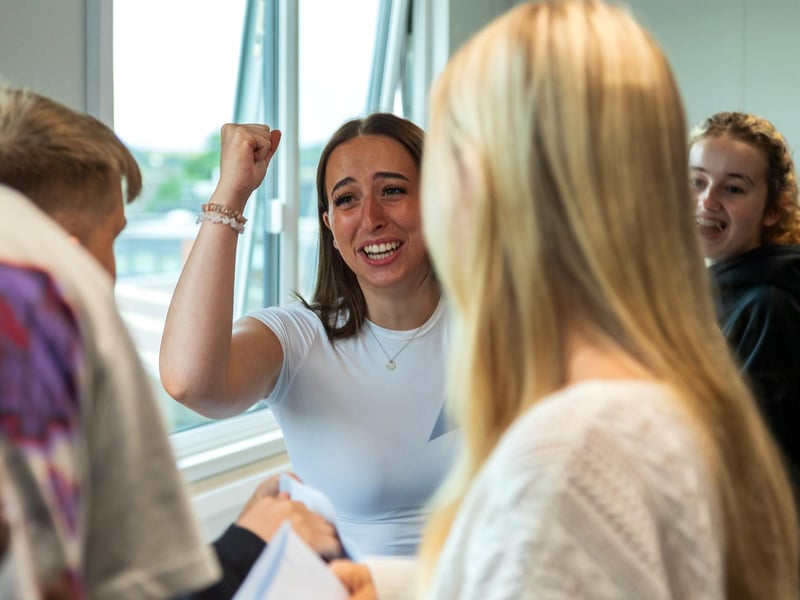 Students celebrate their results at Woodkirk Academy