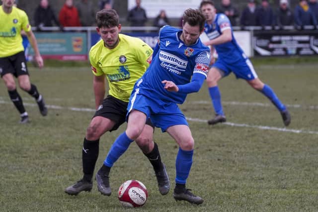 Pontefract Collieries' Gavin Rothery gets on the ball against Worksop Town.