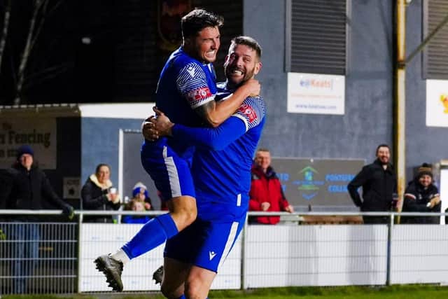 Cody Cromack celebrates with teammate Gavin Allott after scoring Pontefract Collieries' second goal against Dunston UTS. Picture: Josh Harper JLH Photography Yorkshire