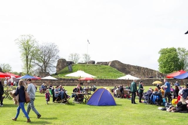 Crowds gathered at Pontefract Castle to watch the Coronation of King Charles. Photo: Bruce Rollinson