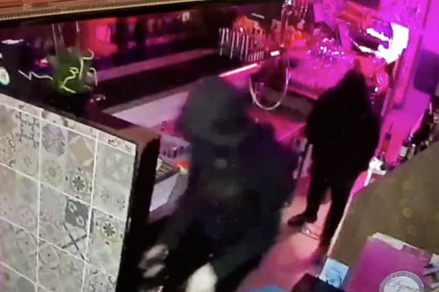 Burglars were caught on camera smashing their way into the restaurant at around 3am.