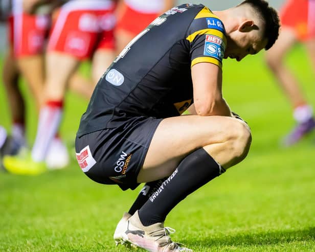 Castleford' Tigers' Sam Wood is dejected as his side slipped to a heavy defeat against St Helens. Picture by Allan McKenzie/SWpix.com
