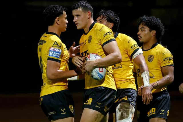 Louis Senior is congratulated on scoring Castleford Tigers' first try. Picture by Ed Sykes/SWpix.com