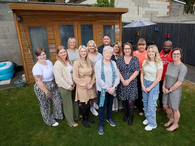 Margaret Isherwood, Wakefield Council's cabinet member for children and young people, with staff at one of the authority's care homes.
