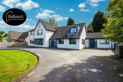 This modern four bedroom family home, on Walton Station Lane, Sandal, is available for £995,000.