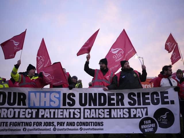 Striking ambulance workers on a picket line last month. (Photo by Christopher Furlong/Getty Images)