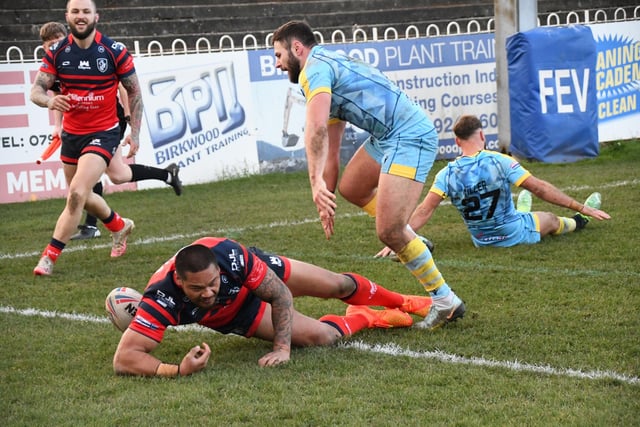 Joey Leilua goes over for a try.