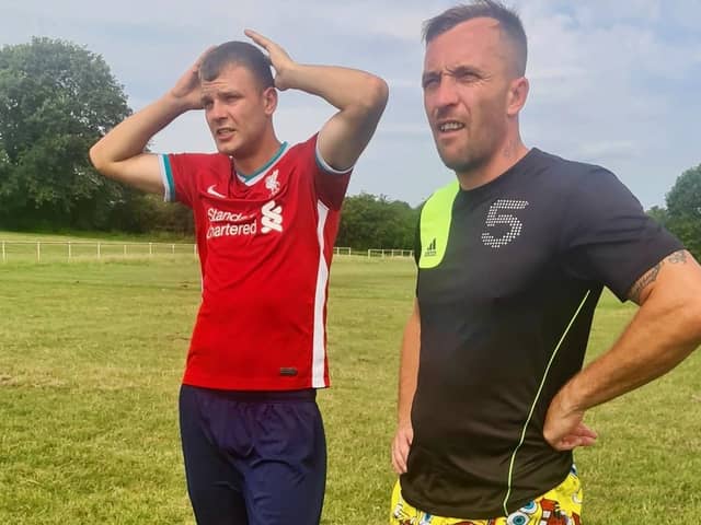 Wakefield Athletic players Danny Jones and Danny Young attentive to instructions during a heat sapped training session.