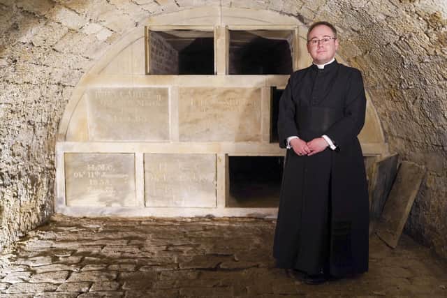 Vicar Father Christopher Johnson in the crypt at the Heritage Open Day at St Peter's and St Leonard's Church.