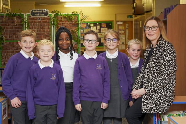 Principal Rebecca Barley with pupils at Outwood Primary Academy Bell Lane. The school has been judged as A Good school with outstanding leadership by Ofsted. Picture Scott Merrylees