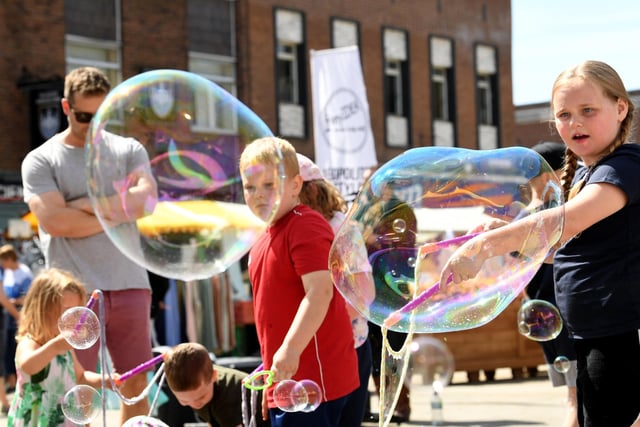 Children played with bubbles at the festival in 2022.