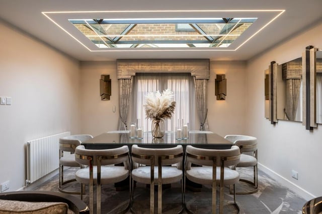 The reception room has been extended to the rear with lantern ceiling creating a sumptuous dining area.