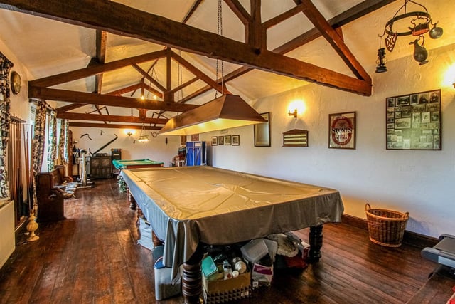 The beamed games room has space for a full size billiards table.