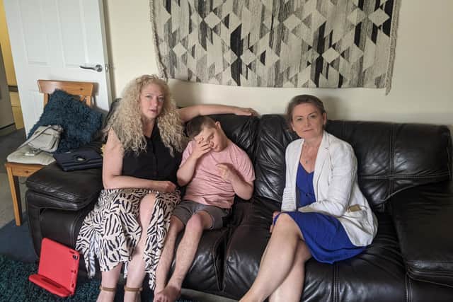 MP Yvette Cooper, right, with concerned parent Samantha Lambert and her son Daniel.