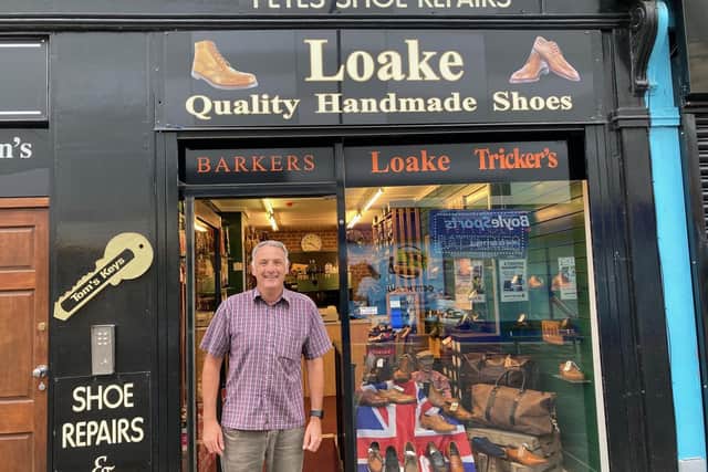 Tom Heaps, owner of Pete's Shoe Repairs, on Teall Street