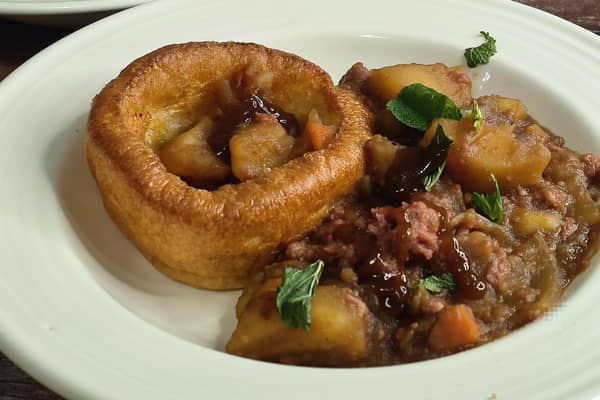 Corned beef hash served with Yorkshire pudding