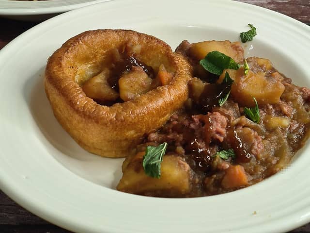 Corned beef hash served with Yorkshire pudding