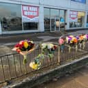 Flowers at the scene where Luke Thompson was attacked