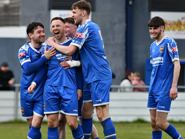 Connor Smythe celebrates scoring one of his two goals against Grimsby Borough with teammates. Pontefract Collieries pictures by Daniel Kerr