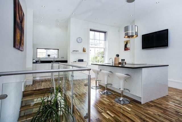 The open plan kitchen is an exceptional feature to this property boasting an Italian style.