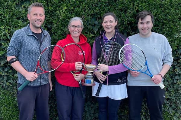 Wakefield Tennis Club's winning team with the Leeds Winter League First Division trophy.