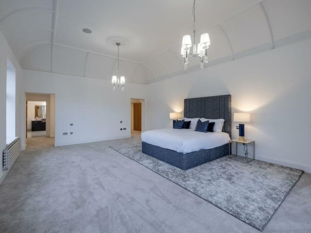 Once a grand ballroom, this space has been transformed into a magnificent principal retreat.