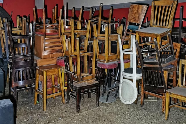 Dozens of chairs scatter the rooms.
